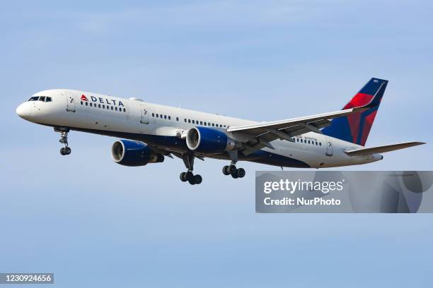 Delta Air Lines Bombardier Boeing 757-200 aircraft as seen arriving, on final approach for landing in New York JFK John F. Kennedy International...