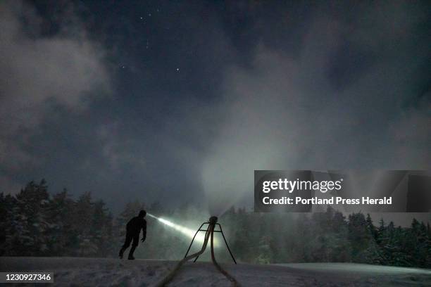 With Orion's belt visible in the sky above, Noah Morton walks into the spray of a ground gun he just set on a run called Risky Business at Sunday...