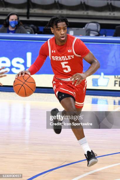 Bradley Braves guard Sean East II dribbles the ball during the Missouri Valley Conference college basketball game between the Bradley Braves and the...