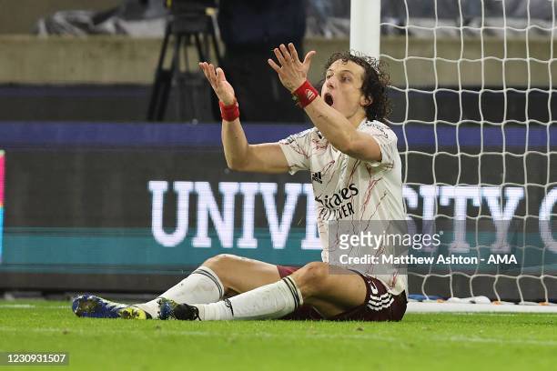 David Luiz of Arsenal reacts after a tackle which results in a red card and a penalty during the Premier League match between Wolverhampton Wanderers...