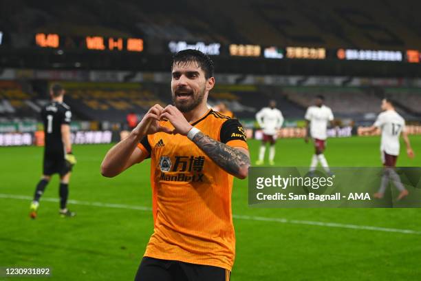 Ruben Neves of Wolverhampton Wanderers celebrates after scoring a goal to make it 1-1 during the Premier League match between Wolverhampton Wanderers...