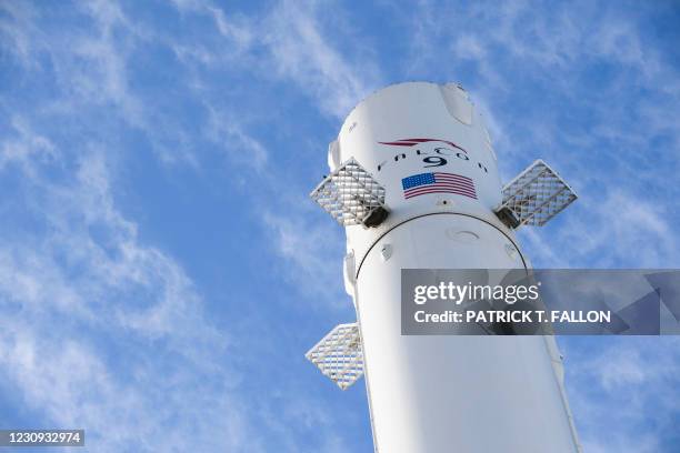 The recovered first stage of a Falcon 9 rocket stands at Space Exploration Technologies Corp. On February 2, 2021 in Hawthorne, California. -...