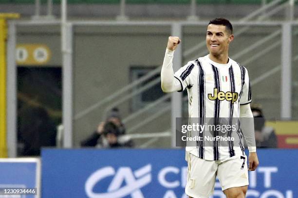 Cristiano Ronaldo of Juventus celebrates after scoring the his team's second goal during the Coppa Italia semi-final match between FC Internazionale...