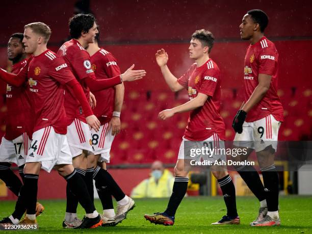 Daniel James of Manchester United celebrates scoring a goal to make the score 9-0 with his team-mates during the Premier League match between...