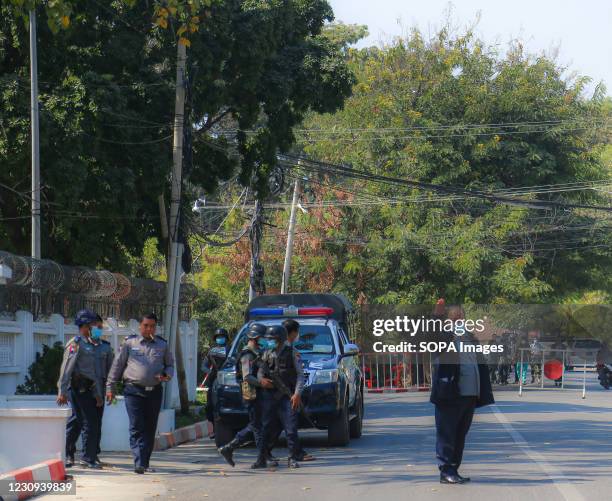 Police officers and a police vehicle seen in front of the Mandalay Chief Minister, Dr. Zaw Myint Maung's House. Following the arrest and release of...