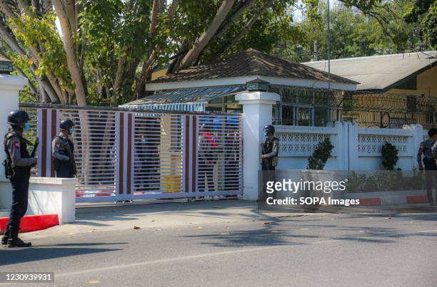 Police officers stand guard in front of the Mandalay Chief Minister, Dr. Zaw Myint Maung's House. Following the arrest and release of Dr. Zaw Myint...