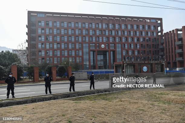 This general view shows the Wuhan Institute of Virology in Wuhan, in China's central Hubei province on February 3 as members of the World Health...