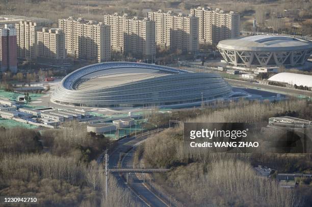 General view shows the National Speed Skating Oval, also known as the 'Ice Ribbon', the venue for speed skating events at the 2022 Winter Olympics,...