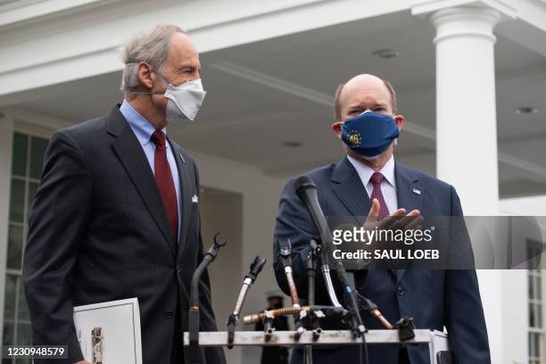 Senator Chris Coons , Democrat of Delaware, and US Senator Tom Carper , Democrat of Delaware, speak to the media outside of the West Wing of the...