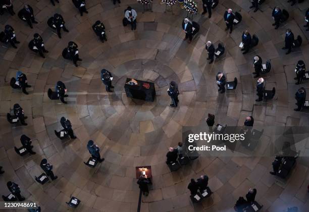 Prayer is read for Capitol Hill Police Officer Brian Sicknick during his memorial service as he lies in honor in the Rotunda of the US Capitol...