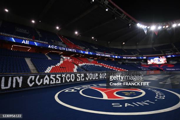 Banner reading "a classico is played with hate and the love of the jersey" prior to the French L1 football match between Paris Saint-Germain and...