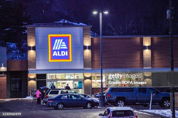 An Aldi logo is seen at one of their stores in Athens. Businesses that line East State Street in Athens, Ohio, an Appalachian community in...