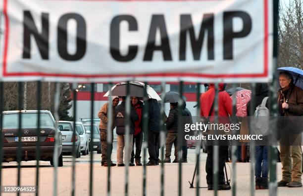 Group of citizens of the north-western Bosnian town of Bihac protests in front of the abandoned "Bira" factory against the possibility of...