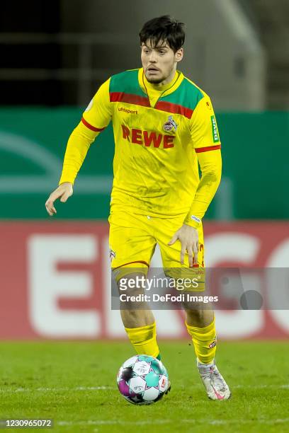 Jorge Mere of 1. FC Koeln controls the ball during the DFB Cup Round of Sixteen match between Jahn Regensburg and 1. FC Köln at Continental Arena on...
