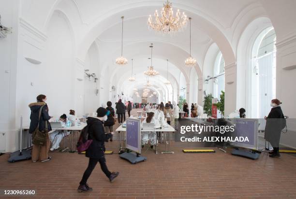An overview shows the new coronavirus test center at the Orangery of the Schoenbrunn Palace on February 4, 2021 as Vienna expands its capacities for...