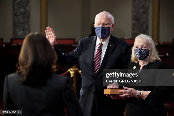 Democratic Senator from Vermont Patrick Leahy participates in a ceremonial swearing in photo op with his wife Marcelle Pomerleau and Vice President...