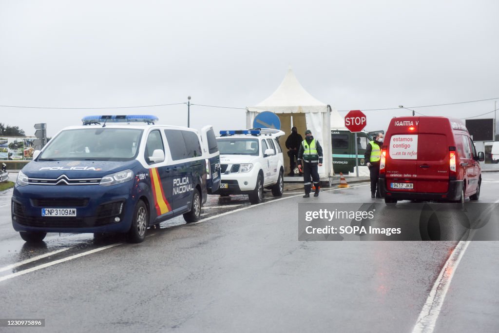 Checkpoint Officers Border Border police officer inspects a vehicle at a checkpoint amid... News ...