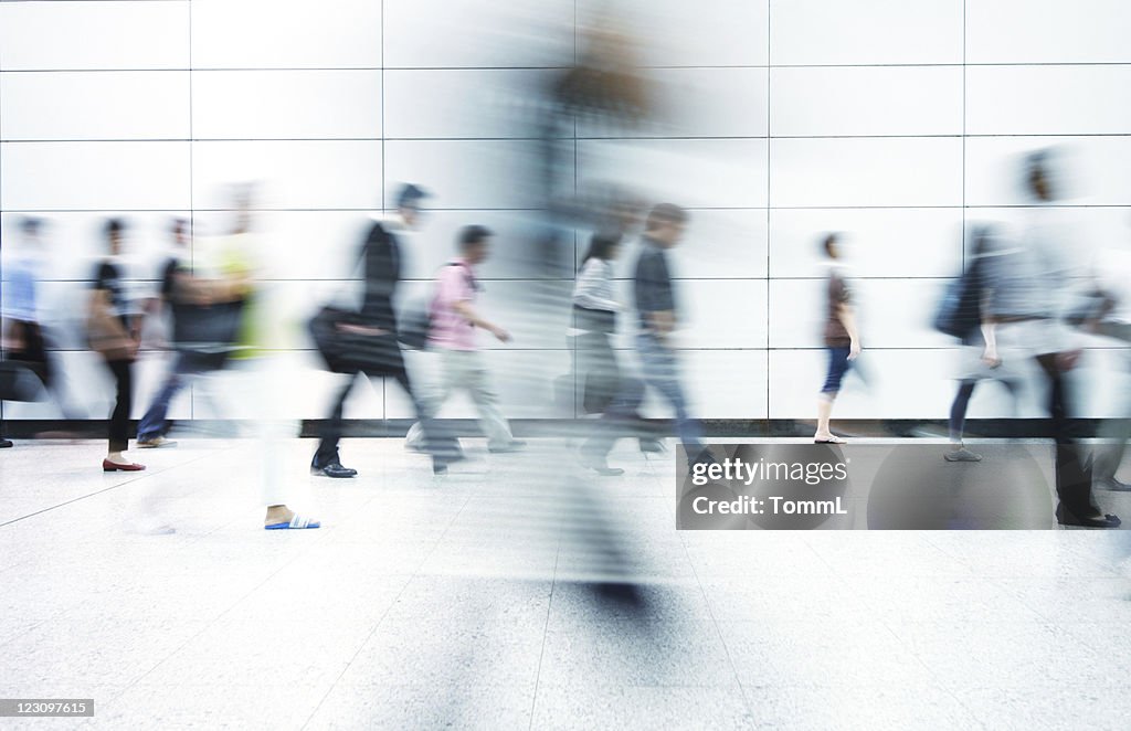 Blurred image of commuters in Hong Kong