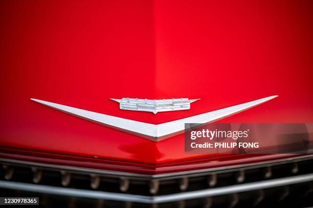 This picture taken on January 16, 2021 shows the hood ornament of a 1959 Cadillac Coupe DeVille at a classic cars gathering in Tokyo.during a...