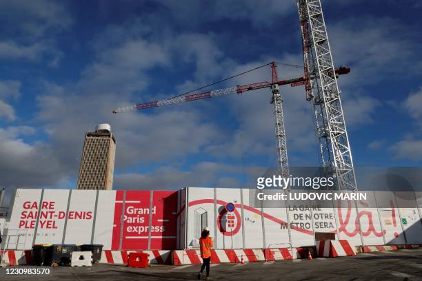 Worker from Eiffage construction arrives on the Saint-Denis Pleyel Station in Saint-Denis on the outskirts of Paris on February 5 which will form...