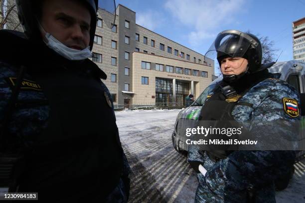 Bailiffs stand guard at the entrance to Babuskinsky district court during the trial against Kremlin critic and Opposition Leader Alexei Navalny on...