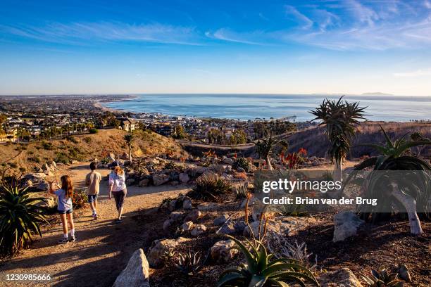 Hikers on a path in the Karoo Gardens section at the Ventura Botanical Garden on Thursday, Jan. 21, 2021 in Ventura, CA.