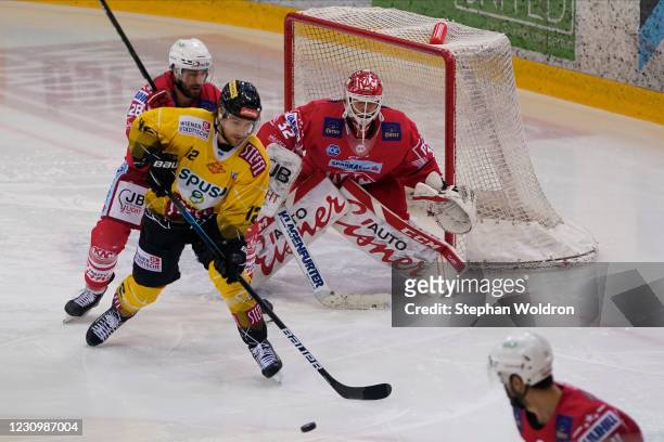 Martin Schumnig of Klagenfurt, Alexander Cijan of Vienna and Sebastian Dahm of Klagenfurt during the Bet-at-home Ice Hockey League match between...