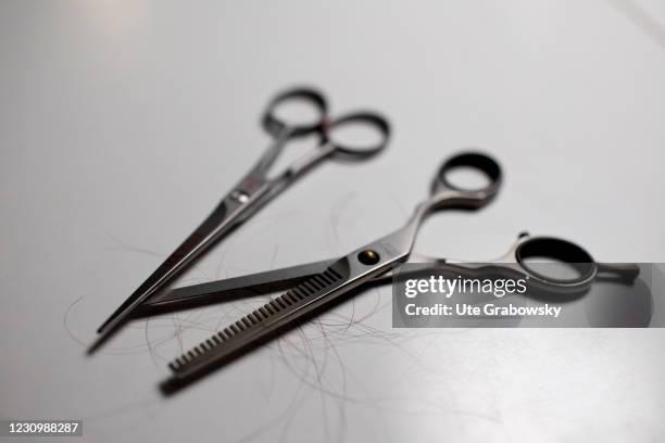 Bonn, Germany In this photo illustration two scissors are on a table on February 05, 2021 in Bonn, Germany.