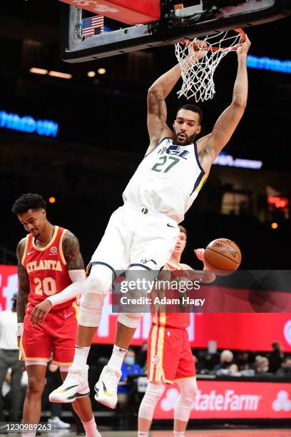 Rudy Gobert of the Utah Jazz dunk the ball against the Atlanta Hawks on February 4, 2021 at State Farm Arena in Atlanta, Georgia. NOTE TO USER: User...