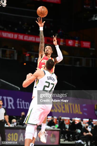 John Collins of the Atlanta Hawks shoots the ball against the Utah Jazz on February 4, 2021 at State Farm Arena in Atlanta, Georgia. NOTE TO USER:...