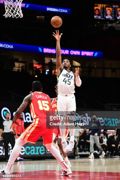 Donovan Mitchell of the Utah Jazz shoots the ball against the Atlanta Hawks on February 4, 2021 at State Farm Arena in Atlanta, Georgia. NOTE TO...