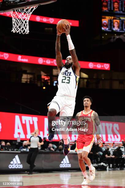 Royce O'Neale of the Utah Jazz drives to the basket against the Atlanta Hawks on February 4, 2021 at State Farm Arena in Atlanta, Georgia. NOTE TO...