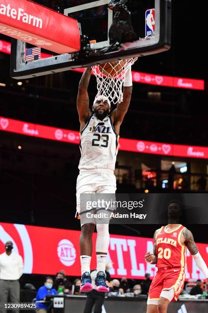 Royce O'Neale of the Utah Jazz dunks the ball against the Atlanta Hawks on February 4, 2021 at State Farm Arena in Atlanta, Georgia. NOTE TO USER:...