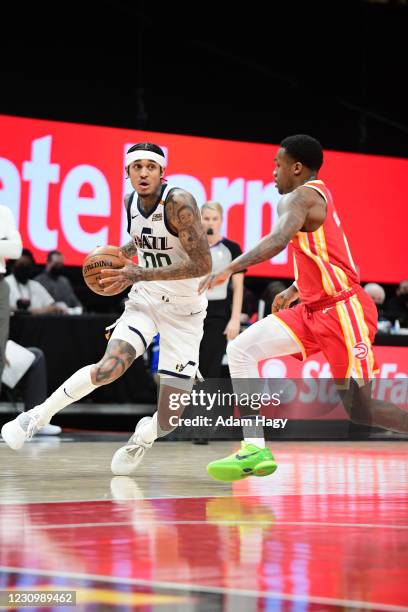 Jordan Clarkson of the Utah Jazz ;dribbles the ball ;against the Atlanta Hawks on February 4, 2021 at State Farm Arena in Atlanta, Georgia. NOTE TO...