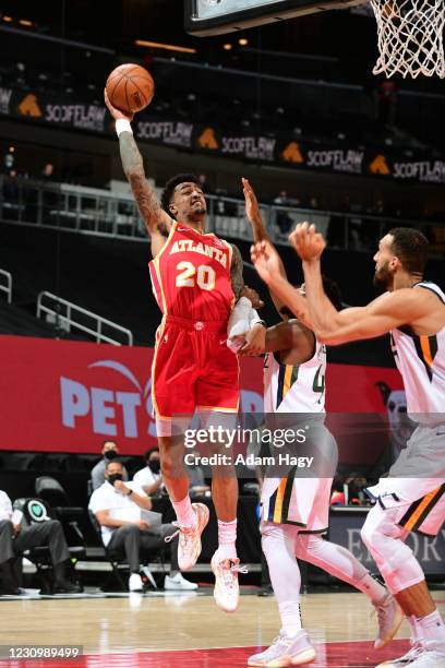 John Collins of the Atlanta Hawks shoots the ball against the Utah Jazz on February 4, 2021 at State Farm Arena in Atlanta, Georgia. NOTE TO USER:...