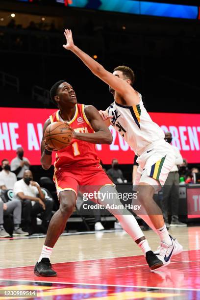 Nathan Knight of the Atlanta Hawks moves the ball against the Utah Jazz on February 4, 2021 at State Farm Arena in Atlanta, Georgia. NOTE TO USER:...