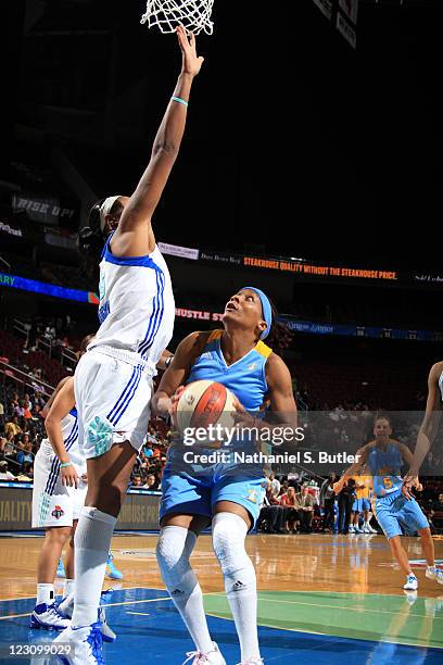 Dominique Canty of the Chicago Sky pump fakes Kia Vaughn of the New York Liberty during a game on August 30, 2011 at the Prudential Center in Newark,...