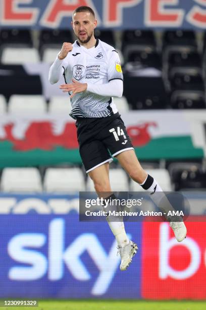 Conor Hourihane of Swansea City celebrates after scoring a goal to make it 2-0 during the Sky Bet Championship match between Swansea City and Norwich...