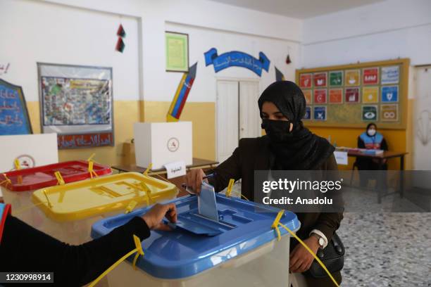 Libyan woman casts her vote to elect Tripoli Municipal Council in Tripoli, Libya on February 06, 2021. Libyas Central Commission of Municipal Council...