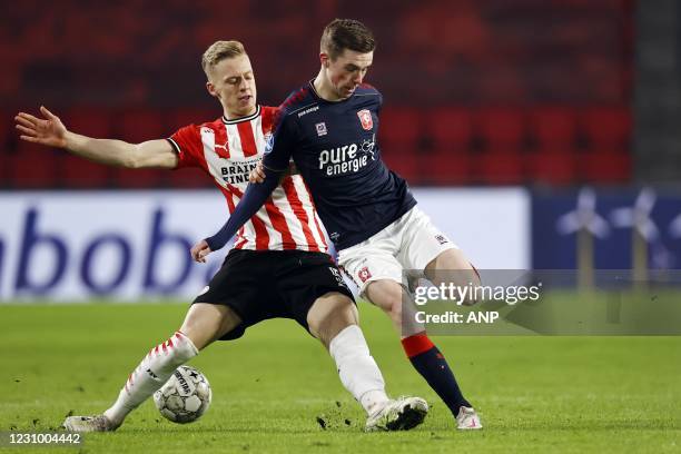 Timo Baumgartl of PSV Eindhoven, Daan Rots or FC Twente during the Dutch Eredivisie match between PSV Eindhoven and FC Twente at the Phillips stadium...