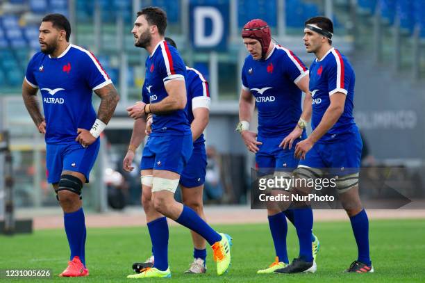 Number 7 and Captain of France Charles Ollivon speaks with his teammates during the 2021 Guinness Six Nations Rugby Championship match between Italy...