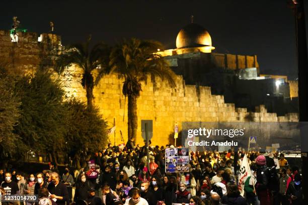 People holding banners gather to protest against the Israeli Prime Minister Benjamin Netanyahu for his failure to combat the novel coronavirus...