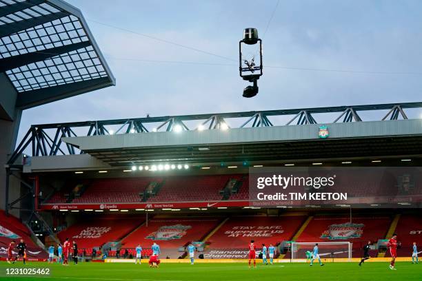Spidercam, TV camera is seen suspended above the pitch before the English Premier League football match between Liverpool and Manchester City at...