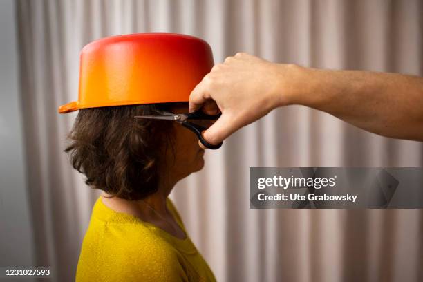 Bonn, Germany In this photo illustration a woman is getting a pot cut. Hairdressers have closed during the lockdown on February 07, 2021 in Bonn,...