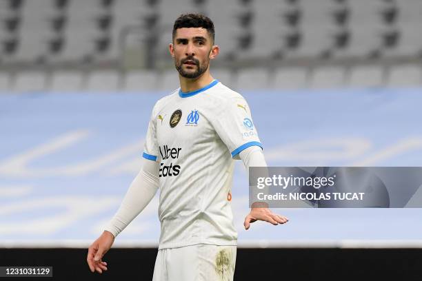 Marseille's Spanish defender Alvaro Gonzalez reacts during the French L1 football match between Olympique de Marseille and Paris Saint-Germain at the...