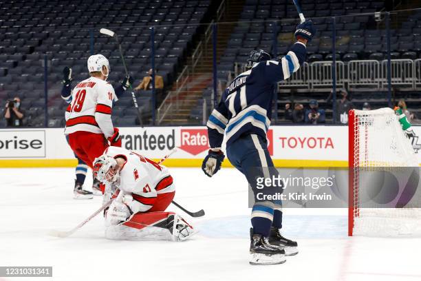Nick Foligno of the Columbus Blue Jackets reacts after beating James Reimer of the Carolina Hurricanes for a goal during the second period at...