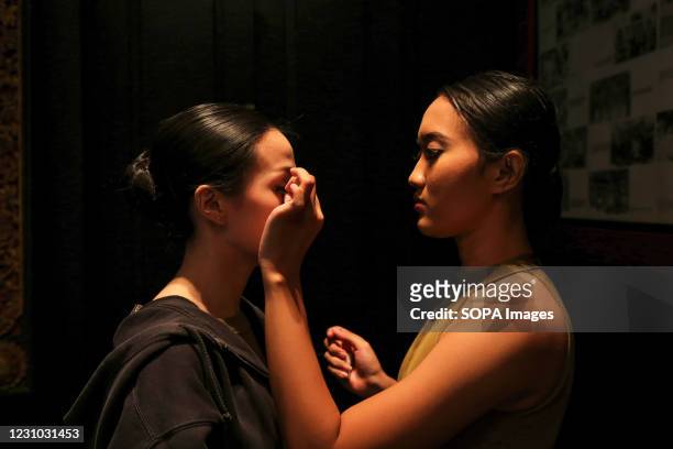 Ballerinas preparing their makeup before performing during the event. Live on Zoom, the Javanese Cross-Cultural Collaboration with Australian Ballet...