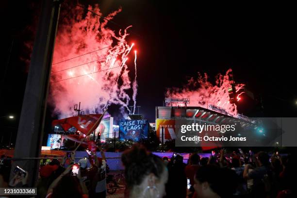 Tampa Bay Buccaneers fans celebrate after Super Bowl LV on February 7, 2021 in Tampa, Florida. Tampa Bay won in dominating fashion 31-9 over...