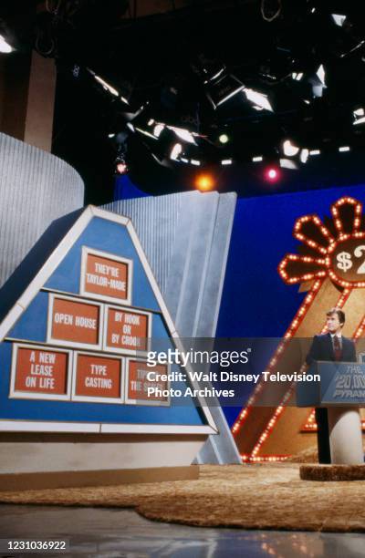 Dick Clark hosting, behind the scenes, making of the ABC tv game show series 'The $20,000 Pyramid', ABC's Pyramid game show series.
