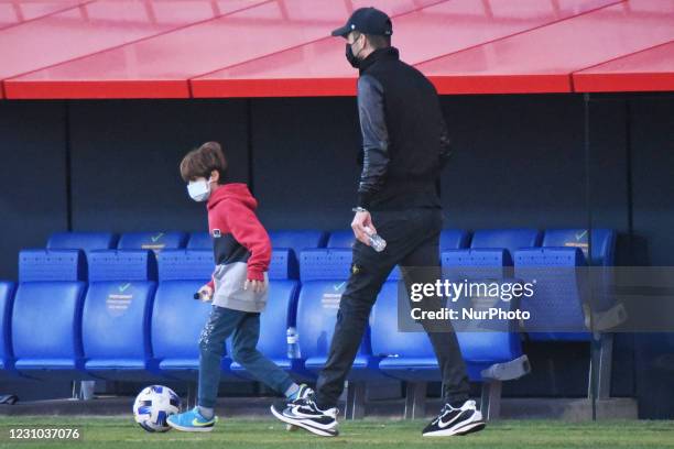 Gerard Pique, owner of FC Andorra, with his son Milan, during the match between FC Barcelona B and FC Andorra, club trained by Eder Sarabia, who was...